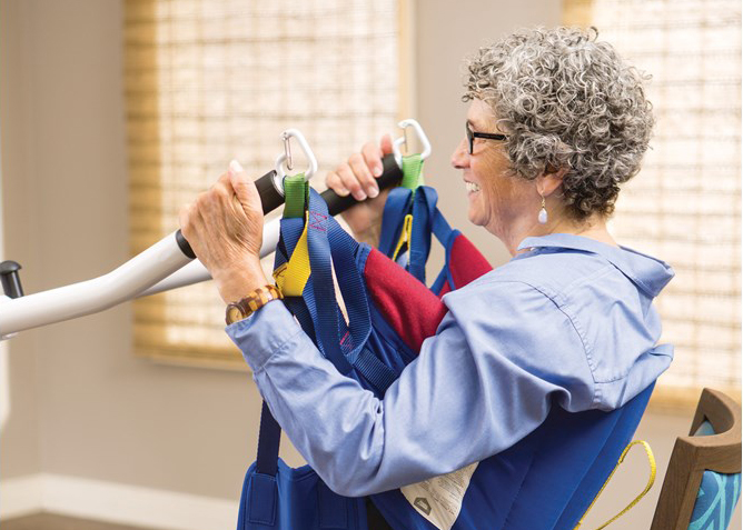 sit to stand lift with patient