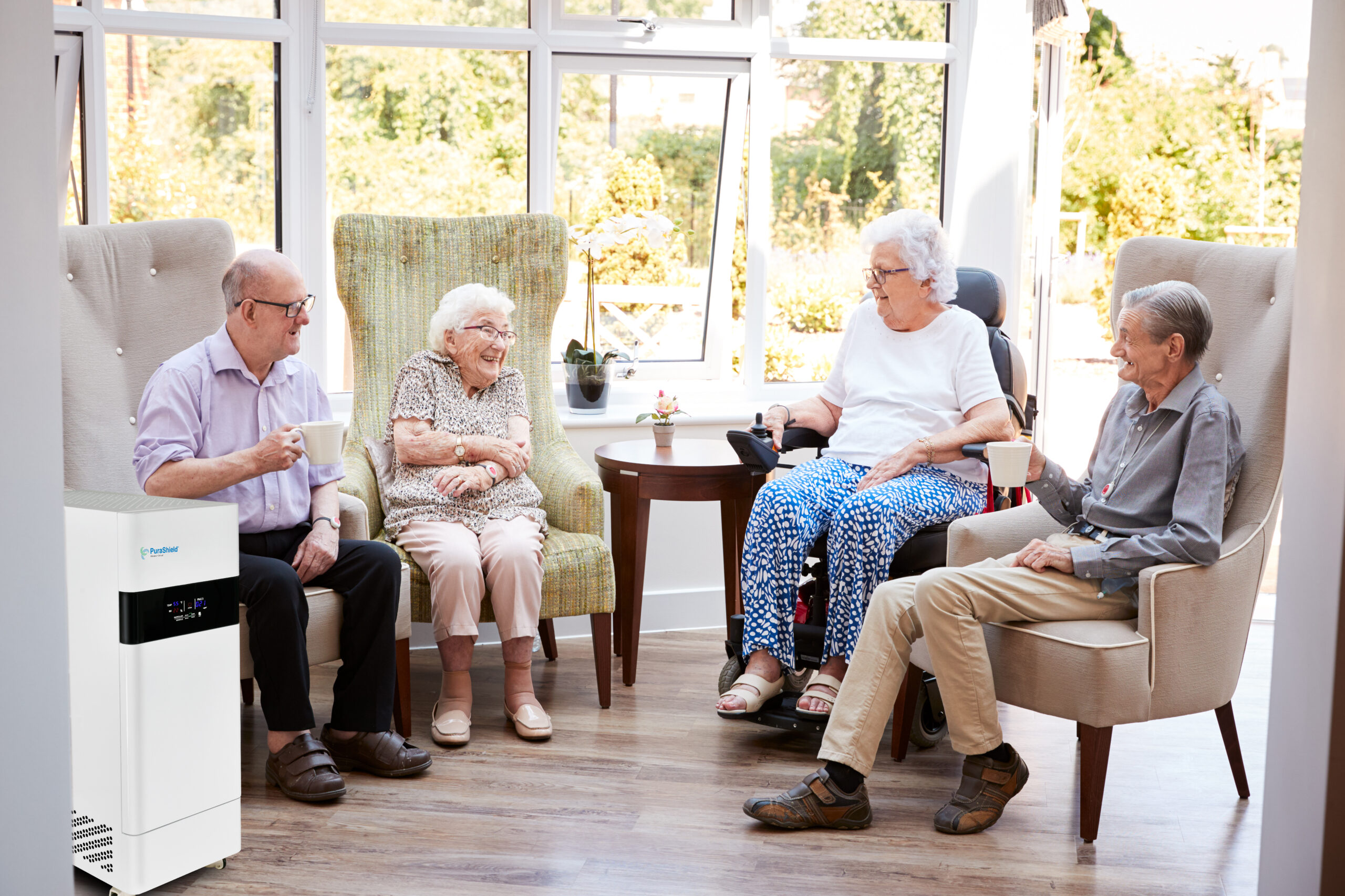 Group Of Seniors socializing in Retirement Home